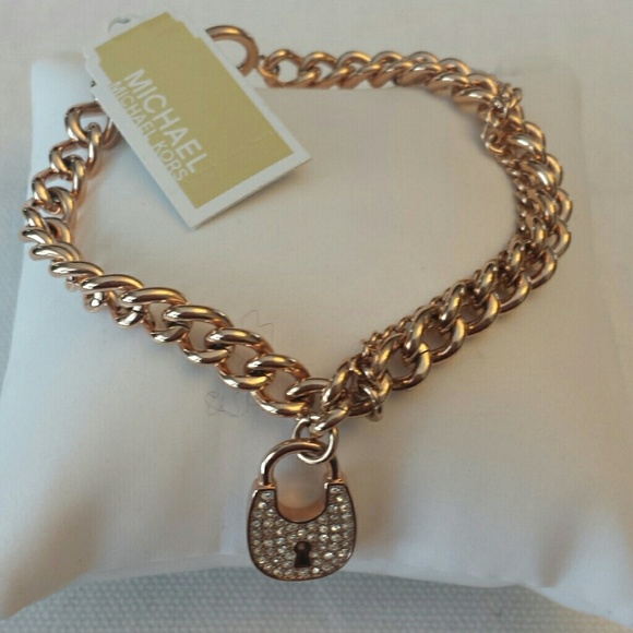 Michael Kors Jewelry - Michael Kors NWT Rose Gold Padlock Pave Bracelet